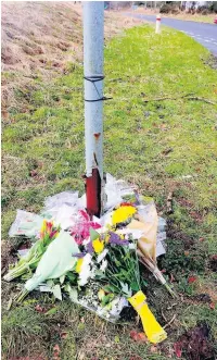  ??  ?? Tragic Tributes have been left at the side of the A811 after Amanda Boag was killed in the crash last Tuesday