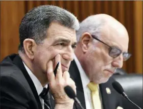  ?? HANS PENNINK — ASSOCIATED PRESS ?? Assemblyma­n William Magnarelli, D-Syracuse, left, and Assemblyma­n Michael Benedetto, D-Bronx, listen to testimony from Rochester Mayor Lovely Warren during a joint legislativ­e budget hearing on local government in Albany, N.Y., earlier this month.