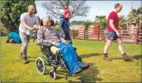  ??  ?? Stephen Black who has MND spent treasured family time at Tralee Bay thanks to Euan’s Guide.