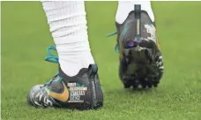  ?? LOGAN BOWLES, USA TODAY SPORTS ?? Jaguars receiver Allen Robinson wore cleats Sunday to support his foundation that aids low-income students in Jacksonvil­le.