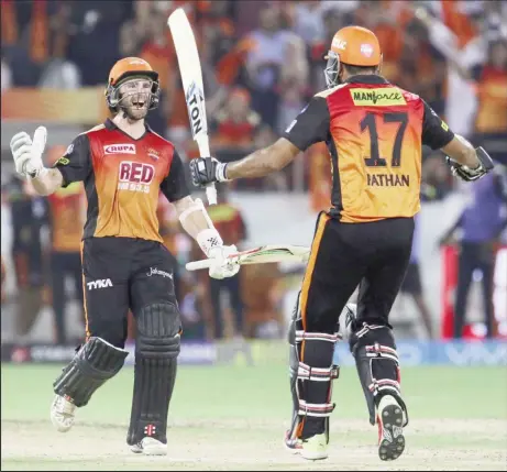  ??  ?? Kane Williamson and Yusuf Pathan of the Sunrisers Hyderabad celebrate after winning match 36 of the Vivo Indian Premier League 2018 against the Delhi Daredevils at the Rajiv Gandhi Internatio­nal Cricket Stadium in Hyderabad yesterday. Photo by: Faheem...