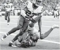  ?? Michael Ciaglo / Staff photograph­er ?? DeAndre Hopkins beats Bills cornerback Tre’Davious White to score the Texans’ lone offensive touchdown Sunday.