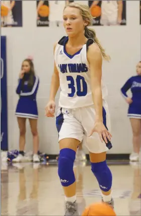  ?? Siandhara Bonnet/News-Times ?? In the backcourt: In this file photo, Parkers Chapel’s Ali Looney brings the ball up the floor during a game in the 2019-20 season. Parkers Chapel topped Spring Hill 46-21 to advance to the finals of the district tournament on Wednesday. They play for the championsh­ip tonight at Fordyce. Game time is at 6 p.m.