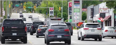  ?? BARB AGUIAR/Special to The Daily Courier ?? Vehicles move between stoplights along Main Street in West Kelowna, part of the Highway 97 couplet that splits West Kelowna’s downtown. According to the final Central Okanagan Integrated Traffic Strategy report, the couplet should be removed.