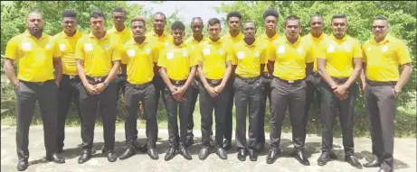  ??  ?? Coach Julian Moore (extreme left) and Manager Andy Ramnarine (extreme right) with the Guyana Under-19 team.