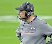  ?? David Becker, The Associated Press ?? Broncos coach Vic Fangio has his hands full trying to coach amid a pandemic.