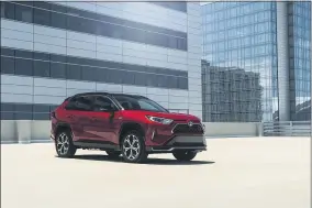  ?? HONS ?? This photo provided by Toyota shows the RAV4 Prime, a plug-in hybrid crossover SUV with all-wheel drive and a battery pack. It offers an estimated 42 miles of electric-only range, among the best in the class.