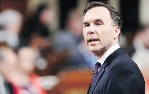  ?? SEAN KILPATRICK / THE CANADIAN PRESS ?? Finance Minister Bill Morneau delivers the federal budget in the House of Commons on Tuesday.