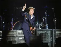  ?? HYOSUB SHIN / HSHIN@AJC.COM ?? Paul McCartney rocked thousands of fans at a concert in Piedmont Park on Aug. 15, 2009.
