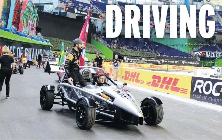  ?? PETER BLEAKNEY/DRIVING.CA ?? Team Canada’s James Hinchcliff­e, left, and Stefan Rzadzinski take a parade lap prior to the Race of Champions Race of Nations in Miami.