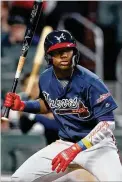  ?? CURTIS COMPTON / CCOMPTON@AJC.COM ?? At the time he was reassigned, Ronald Acuna led the team in homers and steals and was tied for the lead in RBIs and runs.