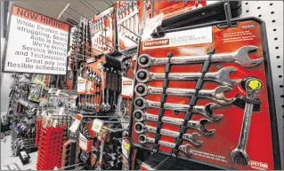  ?? GENE J. PUSKAR / ASSOCIATED PRESS 2011 ?? An assortment of Craftsman wrenches is displayed at a Sears store in Bethel Park, Pa. Sears is selling its well-known Craftsman brand to Stanley Black & Decker Inc., which plans to expand the already popular tool brand by selling the products at more...