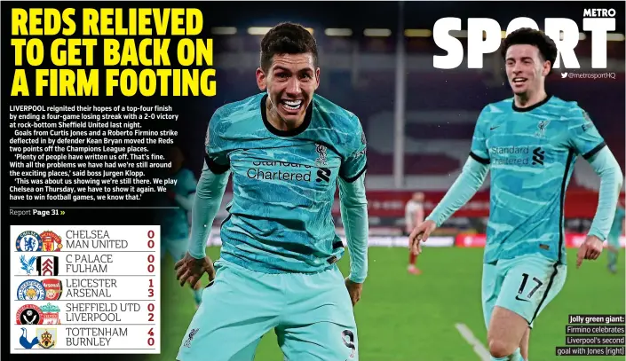 ??  ?? Jolly green giant: Firmino celebrates Liverpool’s second goal with Jones (right)
