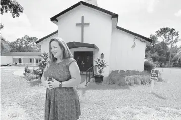  ?? RICH POPE/ORLANDO SENTINEL ?? Rev. Mary Lee Downey, CEO of the Community Hope Center, at the 5.6 acres of land in Kissimmee that was donated to her nonprofit in 2017 by the United Methodist Church. The Community Hope Center intends to use the land to build about 200 affordable apartment units.