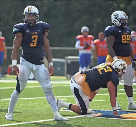  ?? COURTESY OF EAST TEXAS BAPTIST ATHLETIC DEPARTMENT ?? Linebacker C.J. Johnson lines up during an East Texas Baptist practice. Johnson is an undrafted free agent trying to impress the Green Bay Packers.