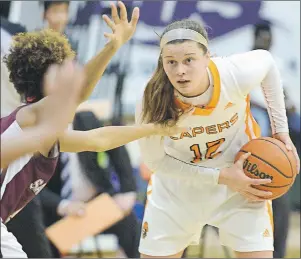  ?? VAUGHAN MERCHANT/CAPE BRETON UNIVERSITY ?? Alison Keough and the Cape Breton Capers women’s basketball team will be gunning for an Atlantic University Sport championsh­ip starting with the quarter-final round Friday in Halifax.w