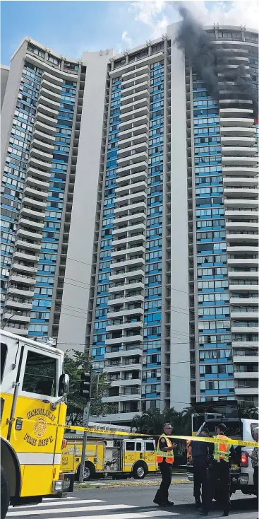  ??  ?? The outside of the Marco Polo building in Honolulu and, top right, charred interior of the unit on the 2 dead were found.