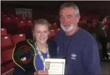  ??  ?? Nicole Moorehouse of Clonard Boxing Club with her coach, TomHayes, after winning the Irish Under-22 57 kg. title at the National Stadium.