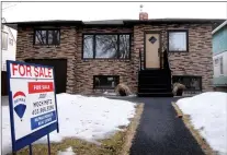  ?? NEWS PHOTO COLLIN GALLANT ?? The Medicine Hat real estate market saw sales remain steady and house prices rise in 2020 following dire prediction­s about the effect of the coronaviru­s pandemic on economic confidence.