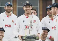  ??  ?? Essex’s Tom Westley poses with the Bob Willis Trophy Final at Lord’s.