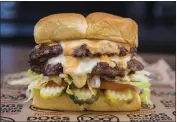  ?? COURTESY OF DOG HAUS ?? Dog Haus is among 40-plus Pasadena restaurant­s taking part in Cheeseburg­er Week from Sunday through Jan. 27.