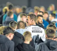  ?? ?? Aaron Muirhead celebrates with the fans