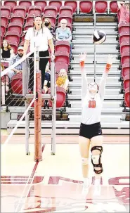  ?? RANDY MOLL EAGLE-OBSERVER ?? Farmington senior setter Remington Adams positions the ball for a hit. Adams played well as the Lady Cardinals defeated Gentry in thee straight sets, 25-8, 25-5 and 25-15, last Thursday. This Thursday, Sept. 2, the Lady Cardinals clash with rival Prairie Grove in the volleyball edition of the ‘Battle of 62.’