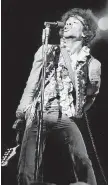  ?? AP ?? Jimi Hendrix performs at the Monterey Pop Festival in June, 1967. The festival helped give birth to the Summer of Love and paved the way for today’s popular festivals.