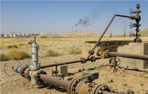  ?? (Photos: Reuters) ?? AN OIL field is seen in Kirkuk, Iraq, in October 2017.