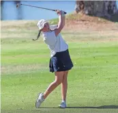  ?? JAY ?? La Quinta’s Joanna Crist hits an approach shot on the 10th hole of the Palmer Course at Mission Hills Country Club during the Desert Empire League girls golf finals on Oct. 17 in Rancho Mirage.