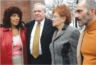  ?? AP FILE PHOTO ?? WRONGLY CONVICTED: Joseph Salvati, second from left, stands with his daughter, Gail Orenberg, left, his wife, Marie, and his son, Anthony, in front of U.S. District Court in Boston in 2006, before the start of his civil suit.
