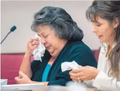  ?? EDDIE MOORE/JOURNAL ?? Former New Mexico Secretary of State Dianna Duran, left, with her attorney, Erlinda Johnson, gets emotional after speaking to the court during her sentencing hearing in Santa Fe on Dec. 14.