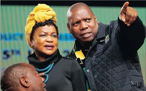  ?? Picture: REUTERS ?? TAKING CHARGE: Speaker of Parliament Baleka Mbete (L) looks on as ANC treasurer general Zweli Mkhize gestures during the African National Congress 5th National Policy Conference at the Nasrec Expo Centre in Soweto.