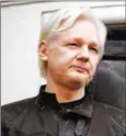  ?? AFP ?? Wikileaks founder Julian Assange speaks on the balcony of the Embassy of Ecuador in London on May 19, 2017.