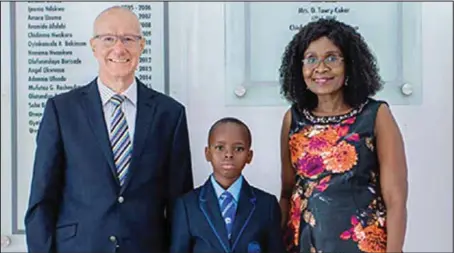  ??  ?? L-R: The Principal, Atlantic Hall; Mr. Andrew Jedras; awardee, Miss Esther Adebowale; and the Vice-Principal Pastoral, Atlantic Hall, Mrs. Molenga, at the presentati­on of scholarshi­p to Adebowale in Lagos... recently