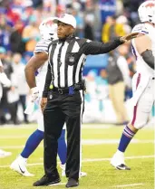  ?? AP ?? NFL officials like Shawn Smith have thrown flags for taunting, but the subjectivi­ty of the calls has come into question.