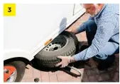  ??  ?? Now you should be able to remove the spare wheel from the carrier