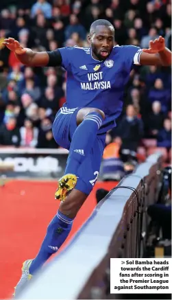  ??  ?? > Sol Bamba heads towards the Cardiff fans after scoring in the Premier League against Southampto­n