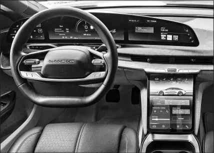  ?? REX TOKESHI-TORRES / COURTESY OF EDMUNDS VIA ASSOCIATED PRESS ?? An interior view displays the 2022 Lucid Air, an electric vehicle whose software allows it to add features via over-the-air updates.