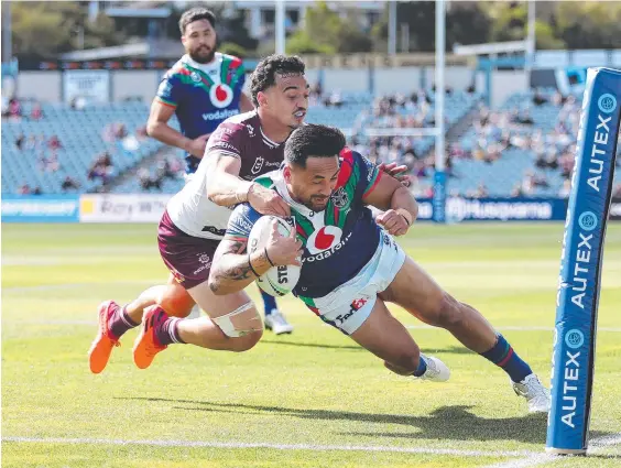  ??  ?? Patrick Herbert scores a try for the New Zealand Warriors against Manly in the 2020 NRL season. Picture: Brett Costello