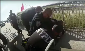  ?? NYPD — THE ASSOCIATED PRESS ?? Police body cam video shows New York City police officers arresting a man on a boardwalk Sunday.