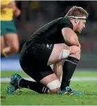  ??  ?? All Black Sam Cane waits for medical staff during the test against the Wallabies at Eden Park last month.