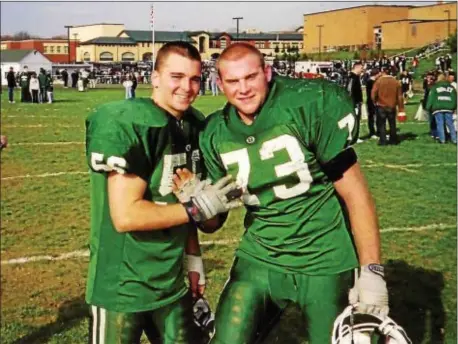  ?? SUBMITTED PHOTO ?? Nick Colleluori, left, seen here with teammate, Ridley co-captain and best friend Craig Oliver, is shown at the 2004 Thanksgivi­ng game against rival Interboro. Colleluori, who also starred in lacrosse, died of cancer a year later.