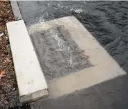  ?? Brian A. Pounds/Hearst Connecticu­t Media ?? Water flows out from a storm drain in Bridgeport in December.