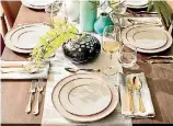  ??  ?? Beautiful glassware is one of the key elements of an elegant table setting.