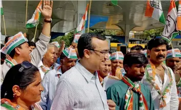  ?? — PTI ?? DPCC president Ajay Maken during a signature campaign to protest against the rise in the prices of petrol and diesel in Delhi on Monday.