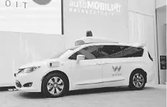  ??  ?? Waymo unveils a Chrysler Pacifica Minivan equipped with a self-driving system developed by the Alphabet Inc unit at the North American Internatio­nal Auto Show in Detroit, Michigan. Fiat Chrysler announced it was creating 2,000 jobs in the United...