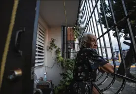  ?? DENNIS M. RIVERA PICHARDO / THE NEW YORK TIMES ?? Georgia Lopez Ortiz, 92, one of many elderly residents of crime-ridden Luis Llorís Torres housing project in San Juan. Puerto Ricans have had to get creative to survive weeks without power or water and food after Maria.