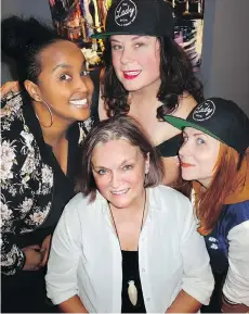  ??  ?? Lady Show actors Fatima Dhowre, Morgan Brayton and Katie-Ellen Humphries back Firehall Arts Centre artistic producer Donna Spencer at a fundraiser there.