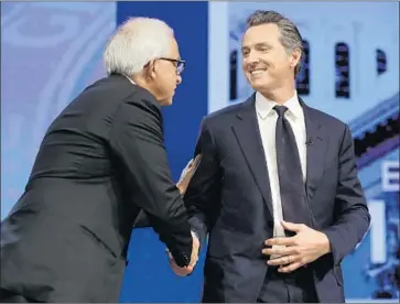  ?? Genaro Molina Los Angeles Times ?? REPUBLICAN John Cox, left, and Democrat Gavin Newsom shake before a January debate at UCLA. As the two duel in the governor’s race, voters can expect to see more attack ads and chatter about President Trump.